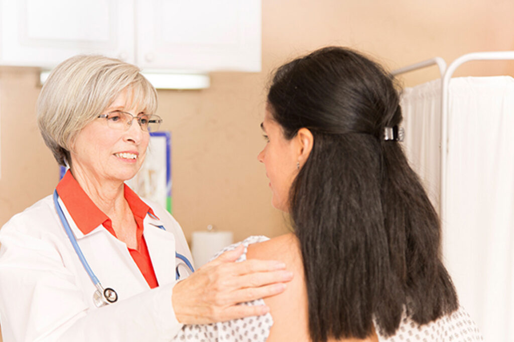 Doctor talking to patient